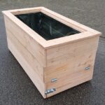 Plantenbak met onzichtbare wielen