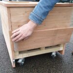 Weggewerkte wielen Douglas plantenbak